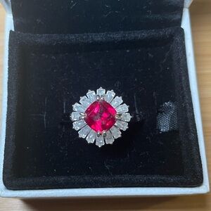 Radiant Silver Ring with Red Gemstone